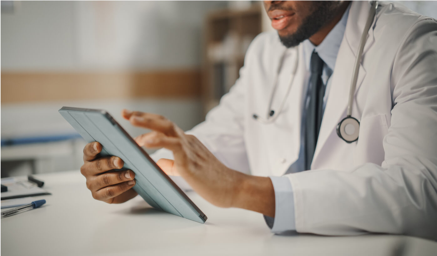 doctor with tablet